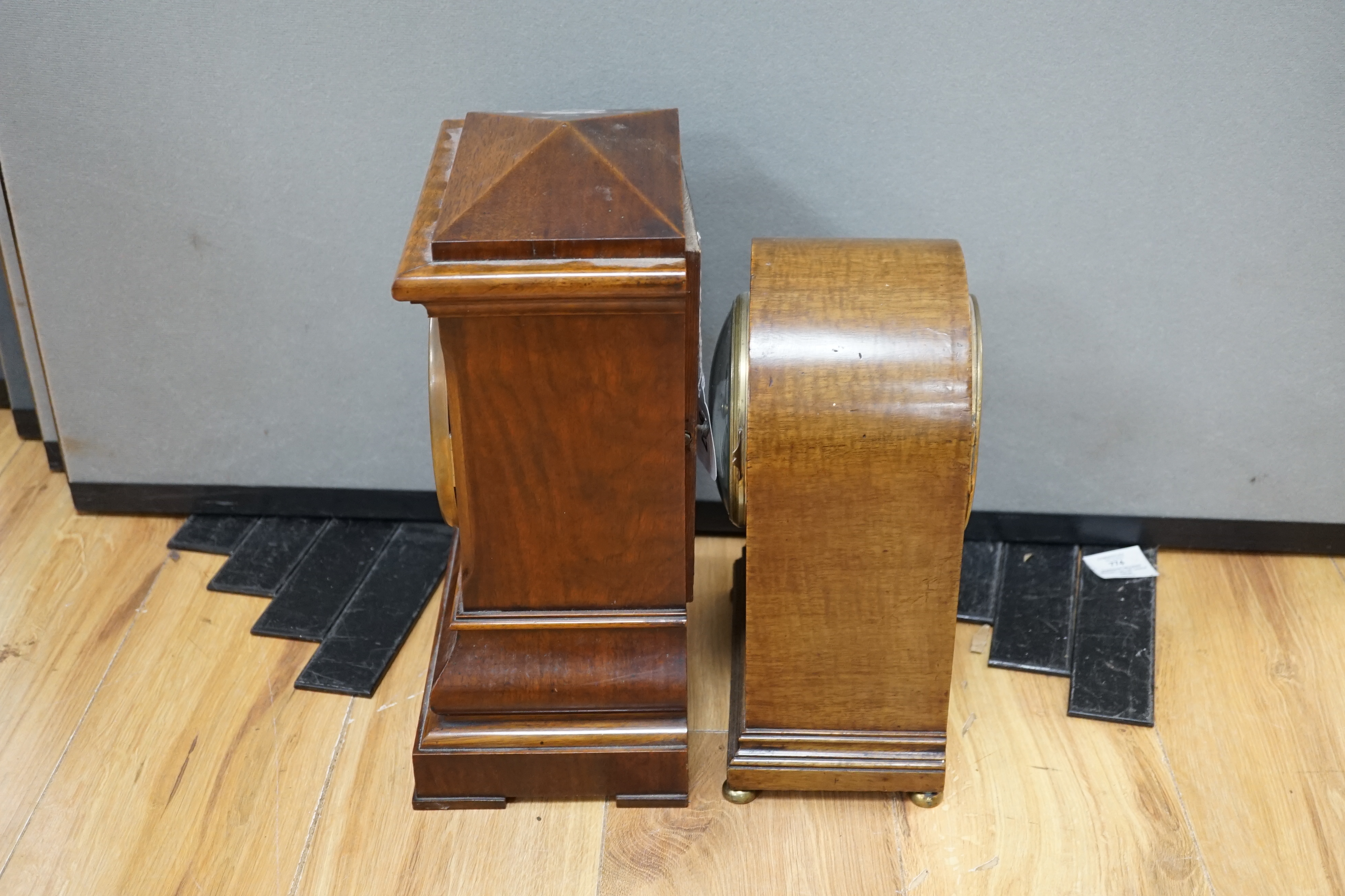 Two early 20th century mantel clocks; a mahogany timepiece and an inlaid Edwardian clock with engine turned face, striking on a coiled gong, tallest 35cm